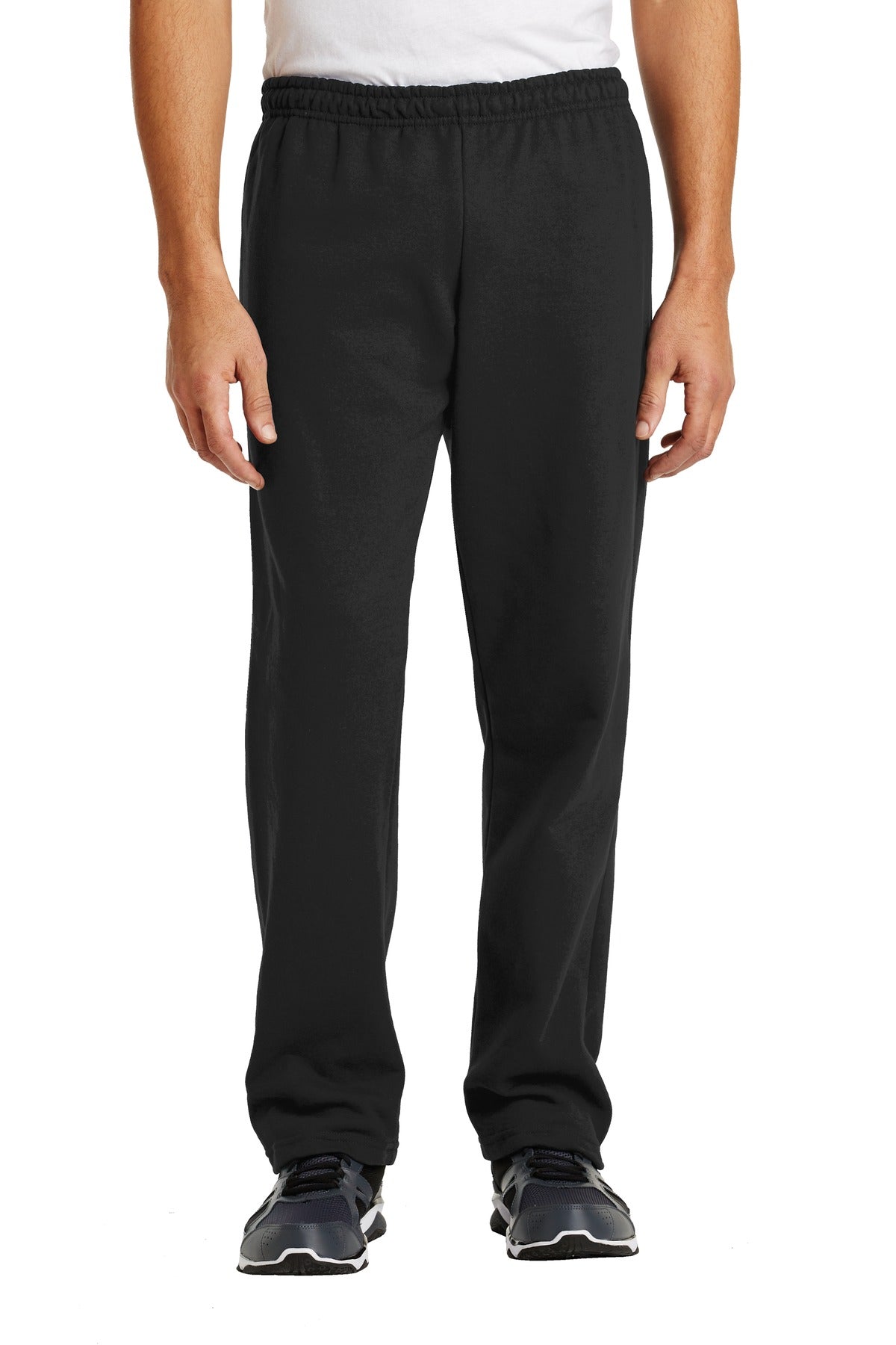 Person wearing black pants on a white background