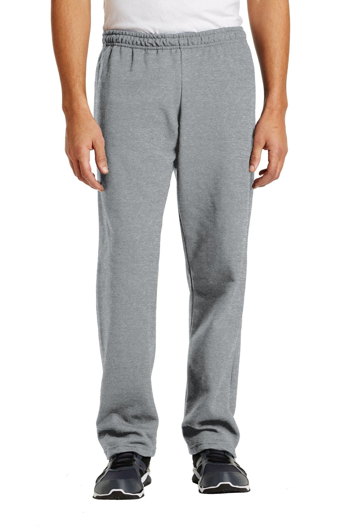 Person wearing gray sweatpants on a white background