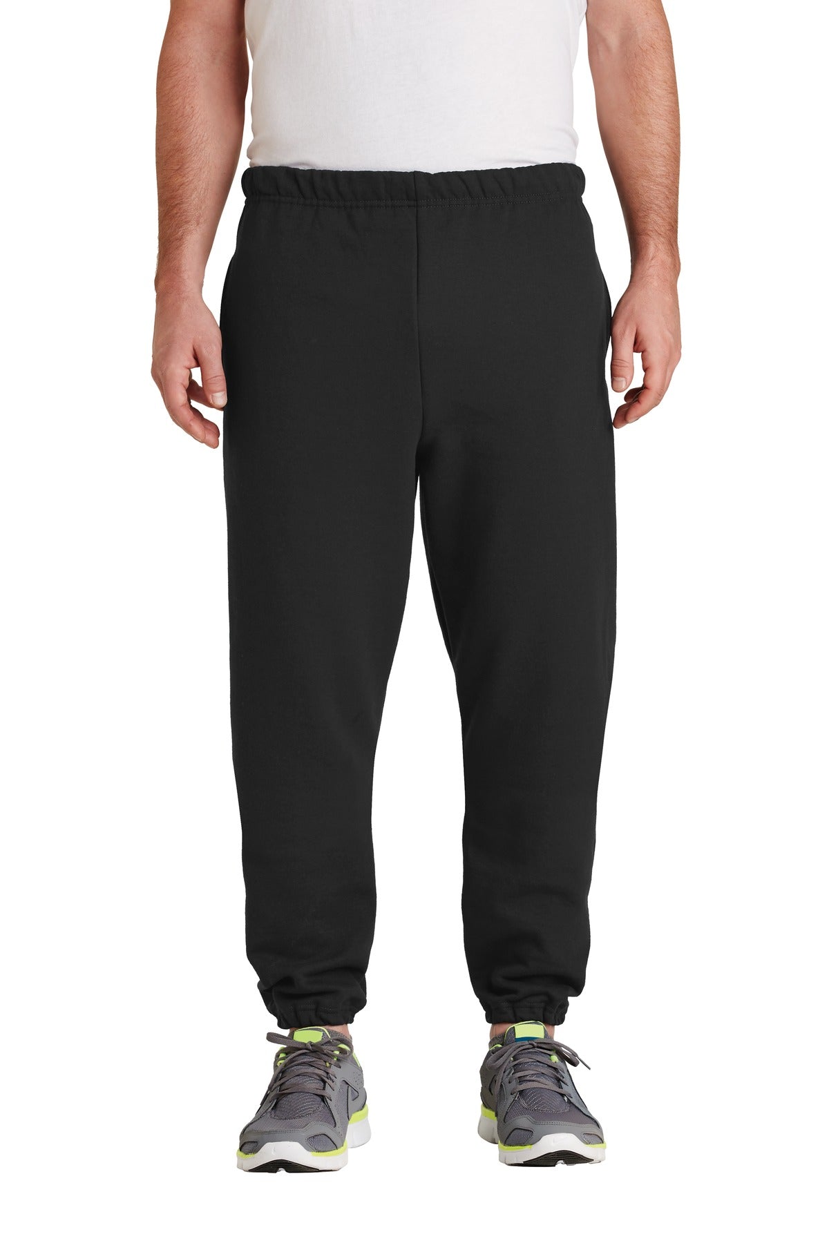 Person wearing black sweatpants on a white background