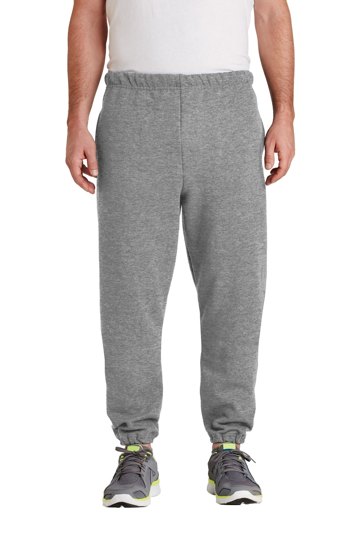 Person wearing gray sweatpants on a white background