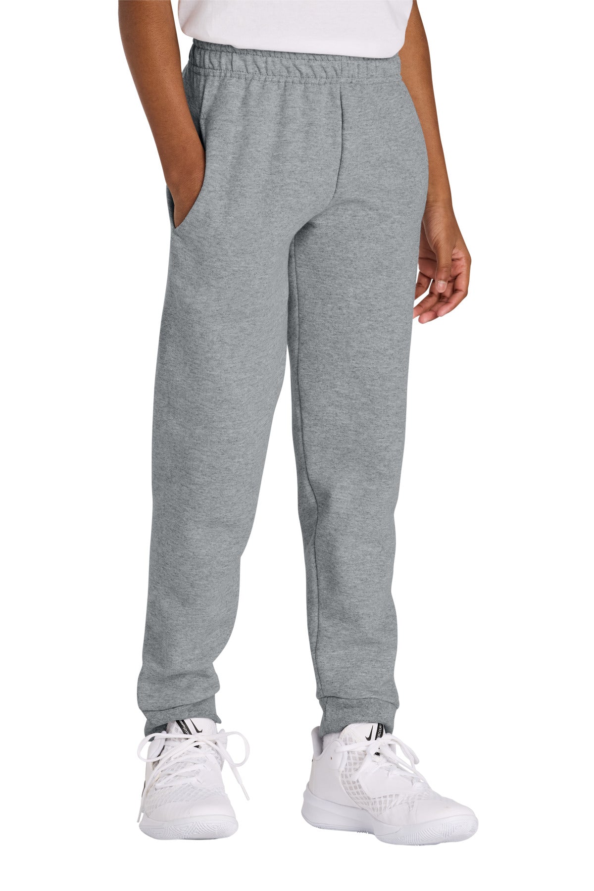 Gray sweatpants worn by a person on a white background