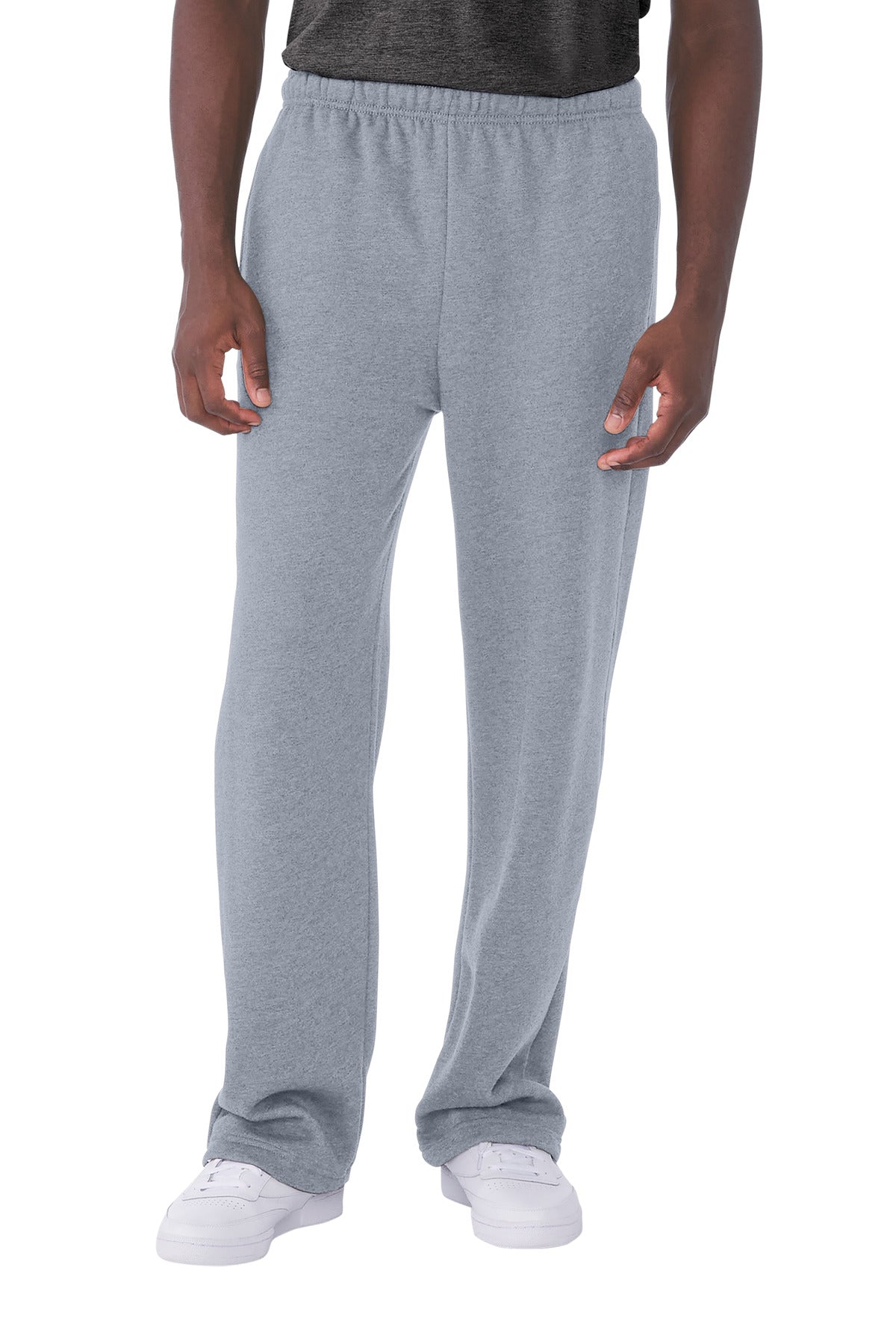 Person wearing gray sweatpants on a white background