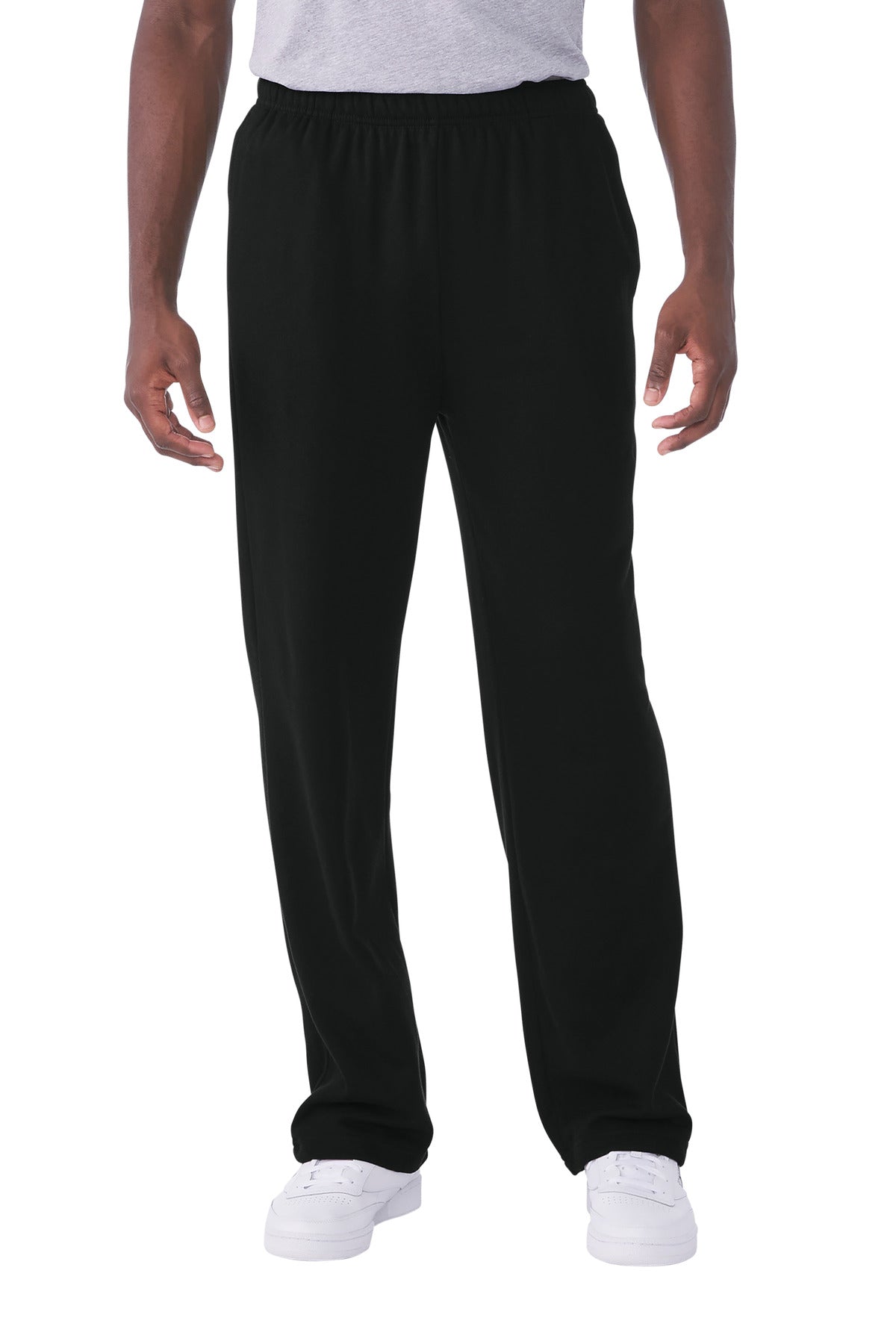 Person wearing black pants on a white background