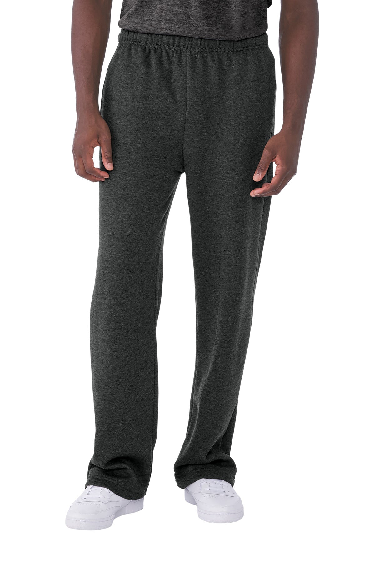 Person wearing dark gray sweatpants on a white background