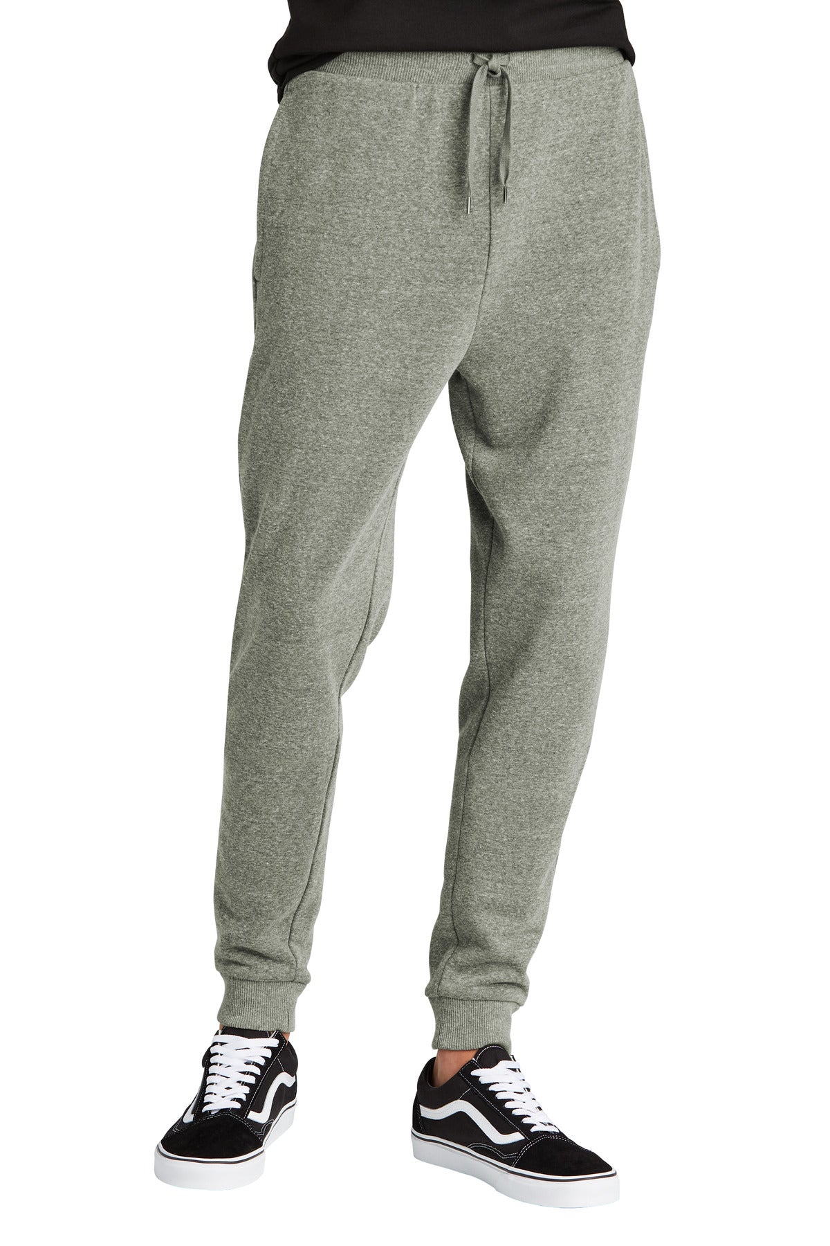 Gray sweatpants worn by a person on a white background