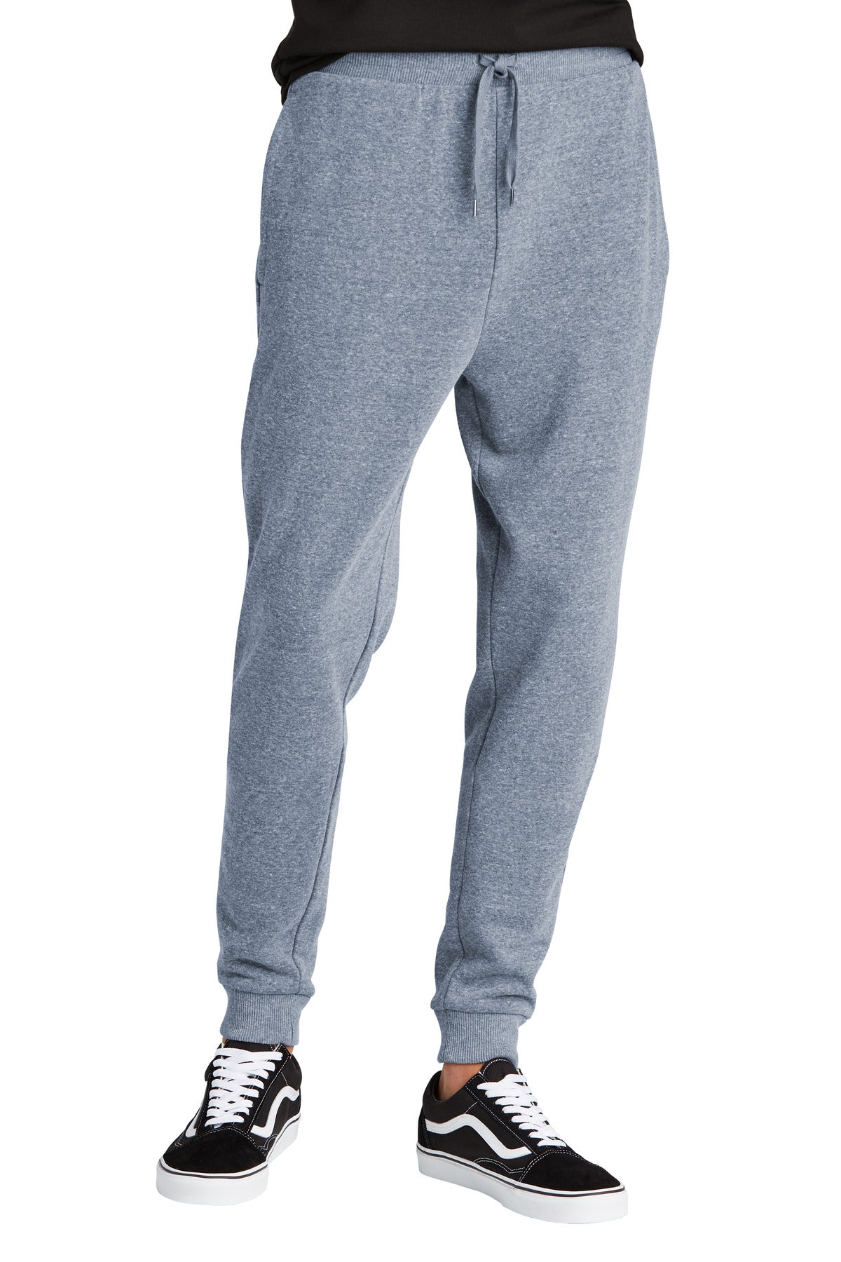 Gray sweatpants worn by a person on a white background