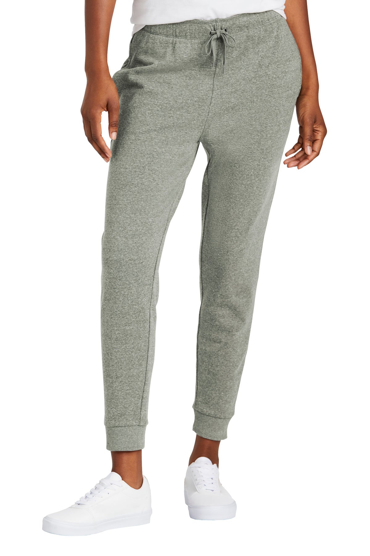 Gray sweatpants worn by a person on a white background