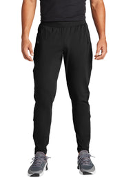 Person wearing black athletic pants on a white background