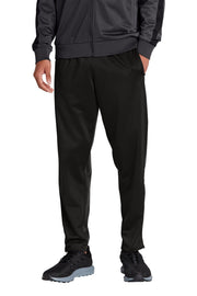 Person wearing black athletic pants and jacket on a white background