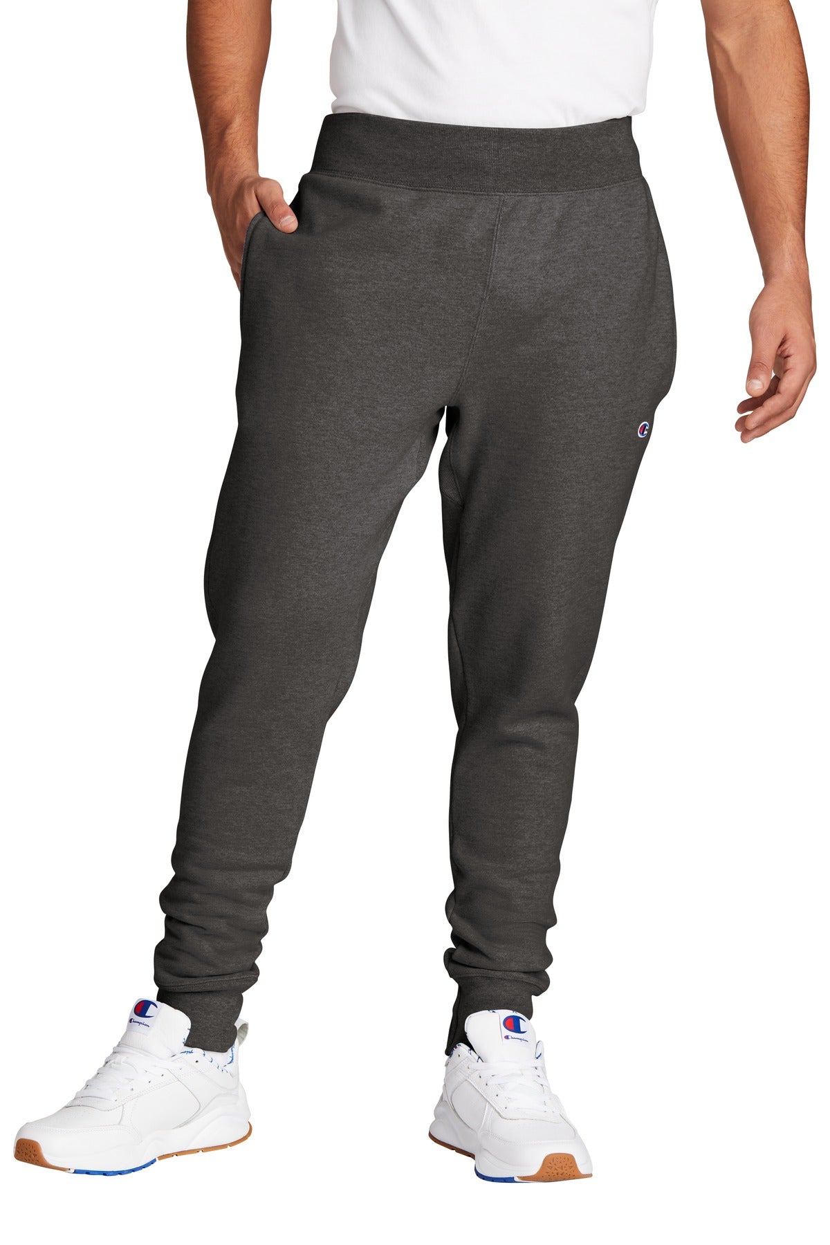 Person wearing gray sweatpants with a white background