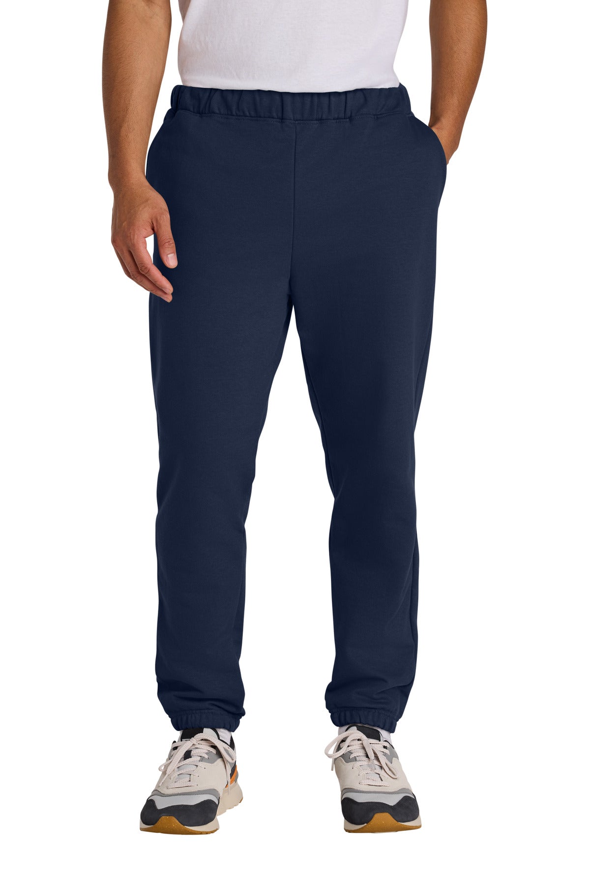 Navy blue sweatpants worn by a person on a white background