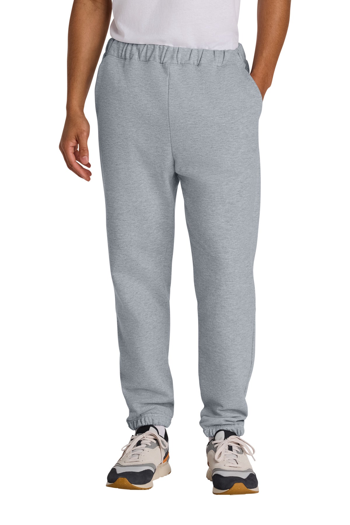 Person wearing gray sweatpants on a white background