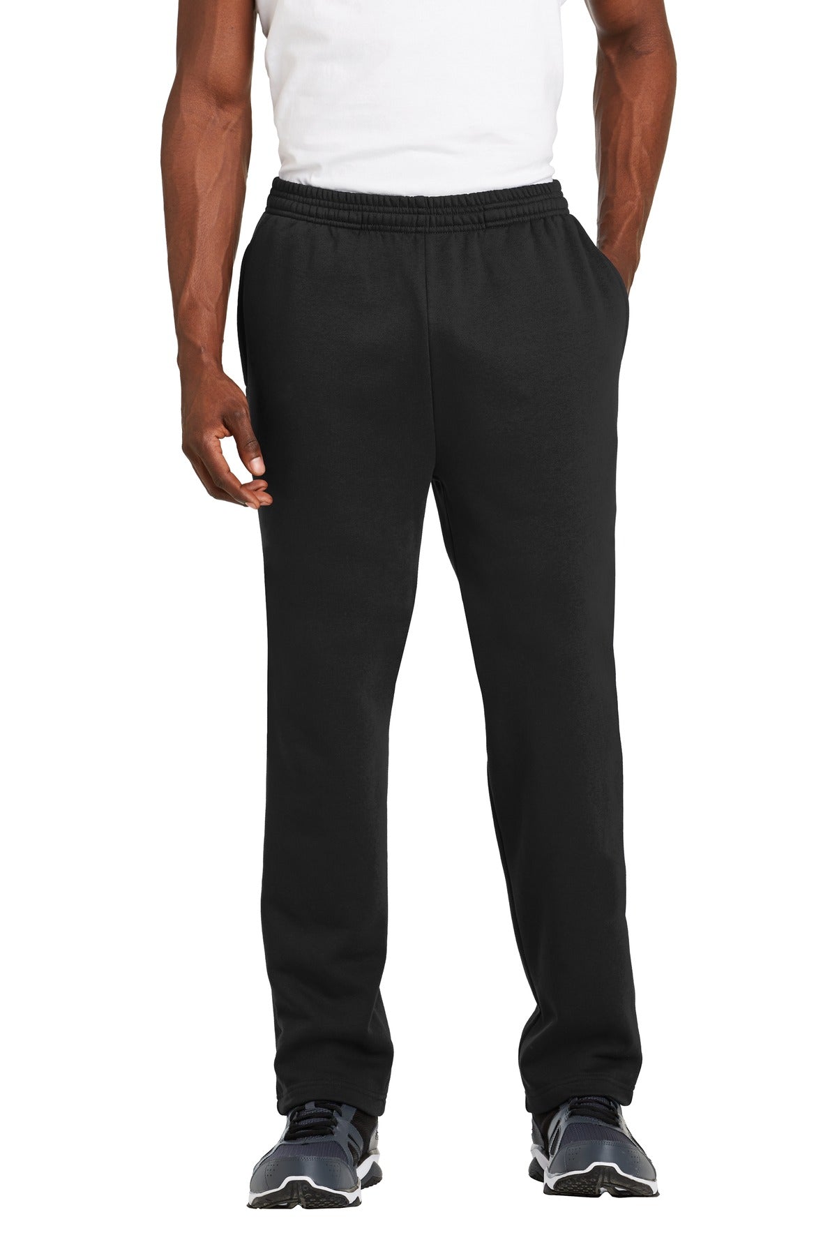 Person wearing black pants on a white background