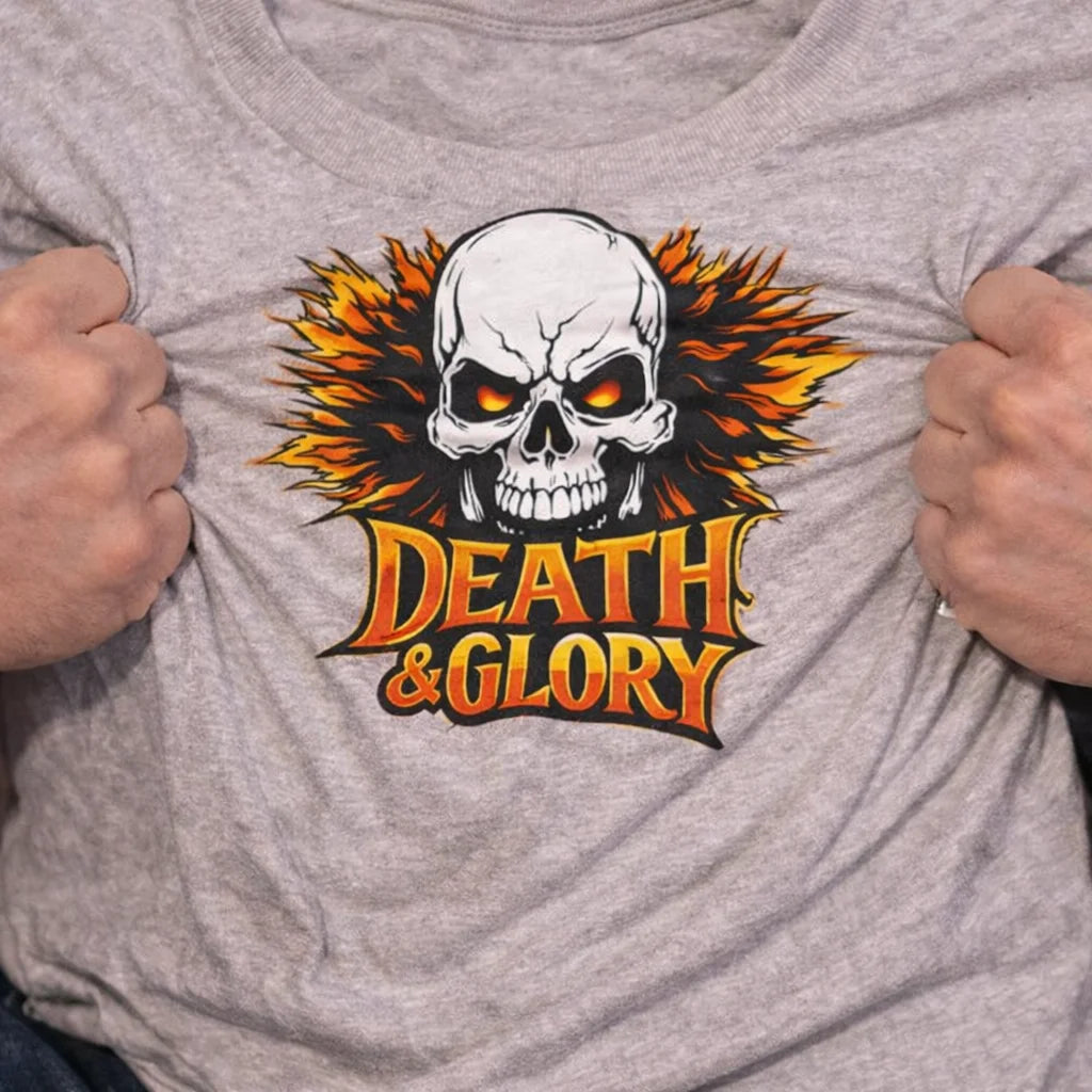 Gray t-shirt with a skull design and 'Death & Glory' text, person wearing it.